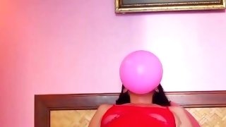 Nice lady inflates balloons and condom. Bikini, underwear, panties, pussy, peignoir 3