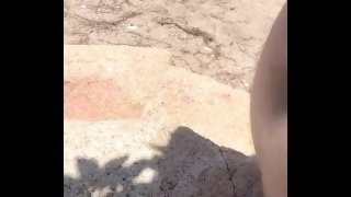 Naked wanking on a rock & cum