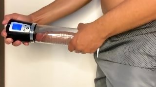 hot endowed man has reached the maximum size of his dick that no longer fits in his cock pump