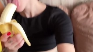 Sexy college girl sucking on a banana