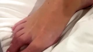 Foot play and masturbation with toy