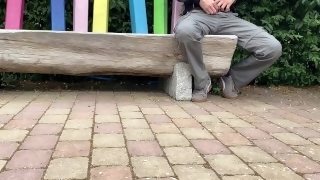 Mother-in-law jerks son-in-law's cock in a public park