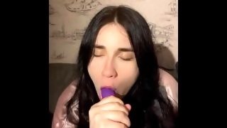 Hot Brunette Fucks Herself in the Mouth with a Huge Dildo and Gets Very Horny