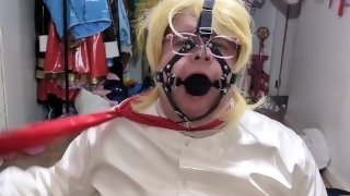 PVC office Lady Gagged and Bound with assorted vibrators in panties