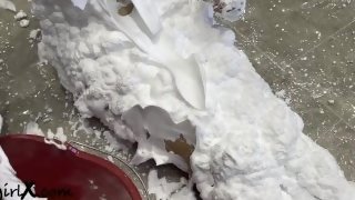 My nude body is covered in foam, then slowly, bit by bit I use an ice scraper to remove the foam