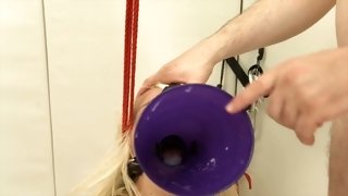 Tied up bitch gags on cock and gets screwed